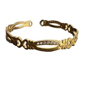 Rhinestone studded gold tone heart floral open cuff bracelet